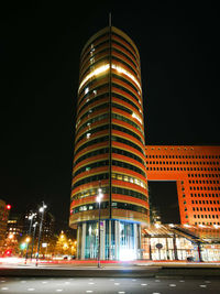 Low angle view of illuminated building at night