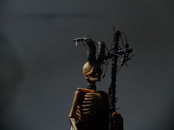 Low angle view of sculpture against clear sky