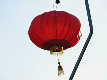 Low angle view of lanterns hanging in row