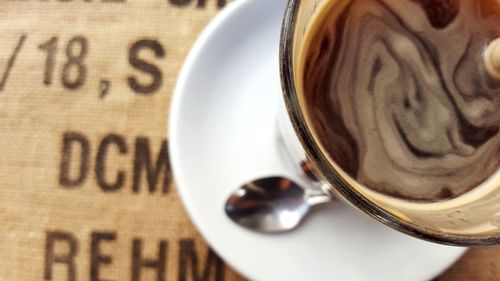 Close-up of coffee cup on table