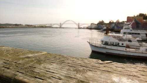 Pier over river against sky