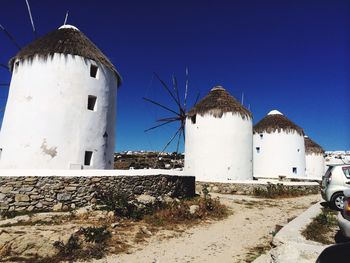Low angle view of building against clear blue sky