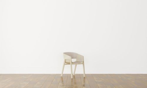 Empty chairs against wall at home