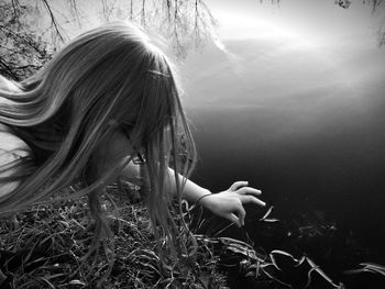 Young woman in grass