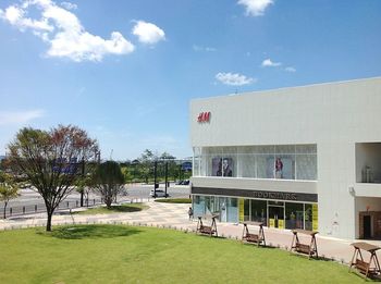 Flag on built structure against sky