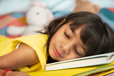 Portrait of girl sleeping at home