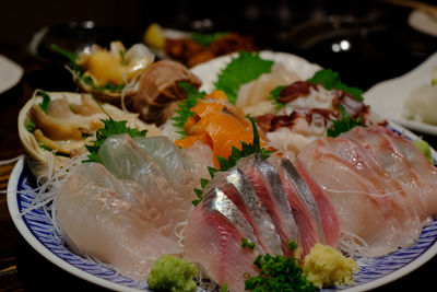 Close-up of fish served in plate on table