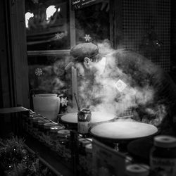 Man preparing food in kitchen