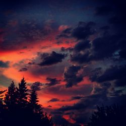 Low angle view of cloudy sky at sunset