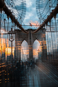 View of bridge against cloudy sky