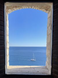 Scenic view of sea against clear sky