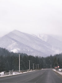 Scenic view of mountains against sky during winter