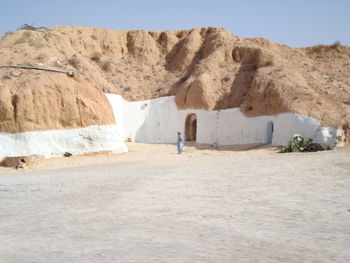 View of desert against clear sky