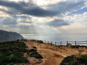 Scenic view of beach against sky