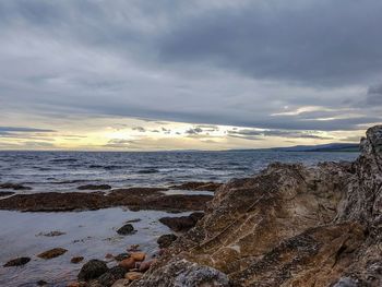 Scenic view of sea against sky during sunset