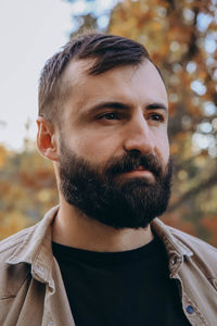 Close-up of young man looking away