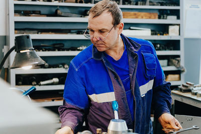 Technician working at workshop