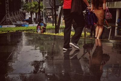 Low section of people in rain