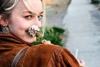 Close-up portrait of smiling woman