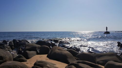 Scenic view of sea against clear sky