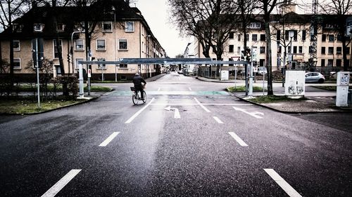 Rear view of a bicyclist on the city street