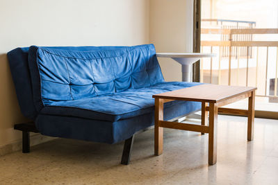 Empty chair on table at home