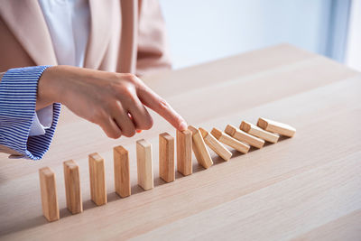 Midsection of man playing board