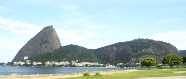 View of sea and mountain against sky