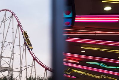 Low angle view of illuminated ferris wheel