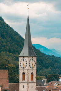 High angle view of building and mountains against sky