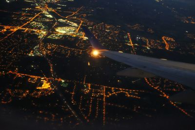 View of illuminated road at night