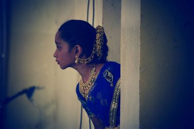 Side view of girl wearing sari