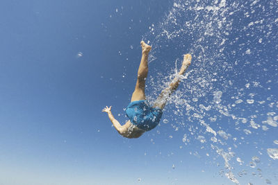 Woman swimming in pool