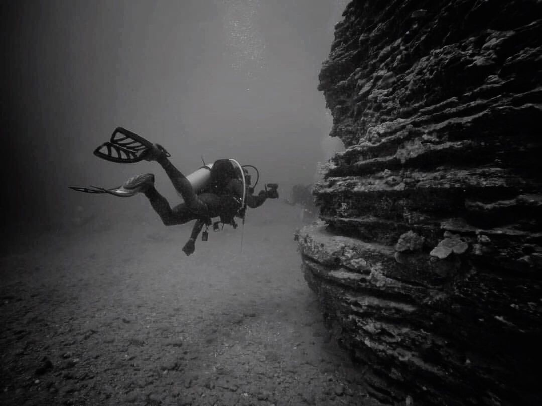 MAN SWIMMING ON SEA