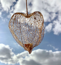 Close-up of heart shape against sky