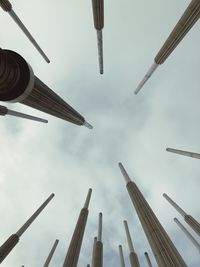 Low angle view of buildings against cloudy sky