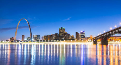 Illuminated buildings in city at night