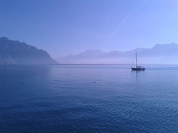 Scenic view of sea against clear blue sky