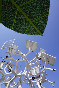 Low angle view of metallic structure against sky