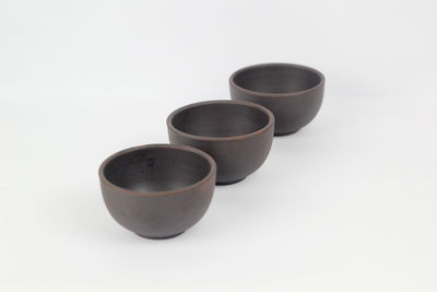 High angle view of empty coffee cup against white background