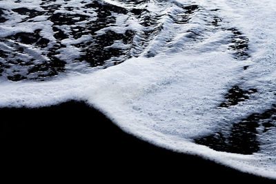 Close-up of snow on sea