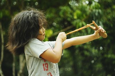 Close-up of girl playing outdoors