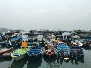 High angle view of boats moored at harbor