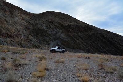 Car on land against mountain
