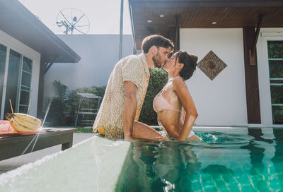 Men in swimming pool