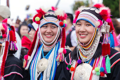 Portrait of smiling young woman in traditional clothing