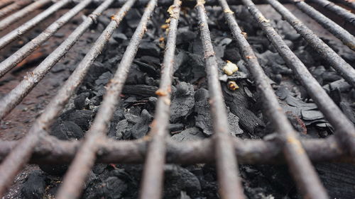 Full frame shot of rusty chain on field