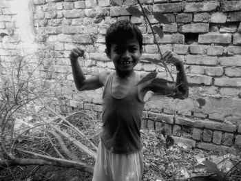 Boy smiling outdoors