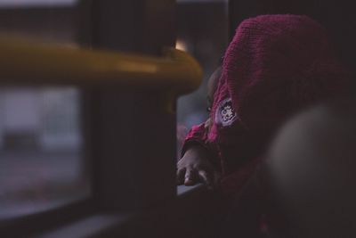 Close-up of girl wearing warm clothing during winter