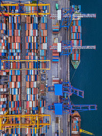 Directly above shot of commercial dock against blue sky